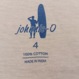 Johnnie-O | TaggyBoy Tagless Pad Printing Machine |Tagless pad prinitng for neck label |tagless pad printing for neck label cost | neck label printing machine |tagless labels for clothing | neck label heat press machine