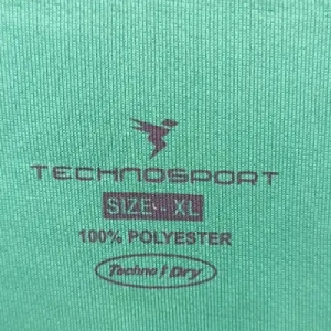 Technosport |sportswear tagless label print on Polyester jersey knit |polyester fabric pad printing |dry fit fabric printing |activewear pad printing |sportswear logo printing |polyester knit printing |microfiber polyester printing |performance fabric printing |synthetic fabric branding