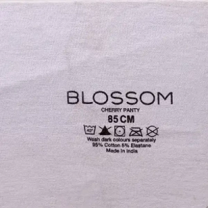 Blossom |Tagless care label print on Cotton innerwear fabric |Tagless Care Label Print on Cotton Innerwear Fabric | Cotton Innerwear Fabric | 100% Cotton Fabric | Combed Cotton Innerwear | Ring-Spun Cotton Fabric | Organic Cotton Innerwear | Cotton Jersey Knit Fabric | Single Jersey Knit | Interlock Knit Fabric | Rib Knit Fabric | Cotton Knit Fabric | Cotton Elastane Fabric | Cotton Lycra Fabric | Stretch Cotton Fabric | Soft Cotton Fabric | Breathable Cotton Fabric | Lightweight Knit Fabric | Hosiery Fabric | Underwear Fabric | Briefs Fabric | Boxer Shorts Fabric | Trunks Fabric | Vest Fabric | Undershirt Fabric | Thermal Innerwear Fabric | Intimate Apparel Fabric | Men's Innerwear | Women's Innerwear | Comfort Wear Fabric | Tagless Care Label Print | Tagless Label Printing | Printed Care Label | Wash Care Label Printing