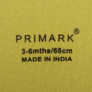 tagless neck label print on Cotton-poly blend knit fabric |cotton fabric pad printing |cotton jersey printing |cotton knit label printing |combed cotton printing |organic cotton garment print |cotton innerwear branding