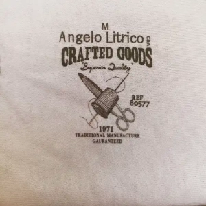 Angelo Litrico |cotton-poly knit fabric|vintage-style tagless garment print label on cotton fabric |Printing on Cotton-Poly Knit Fabric | Cotton Poly Knit Fabric | Cotton Polyester Knit Fabric | Poly Cotton Knit Fabric | Cotton Polyester Blend Fabric | Cotton Rich Knit Fabric | Poly Cotton Jersey Knit | Cotton Polyester Jersey Fabric | Single Jersey Knit Fabric | Interlock Knit Fabric | Rib Knit Fabric | Cotton Poly Lycra Fabric | Cotton Poly Spandex Fabric | Stretch Knit Fabric | Soft Touch Knit Fabric | Breathable Knit Fabric | Lightweight Knit Fabric | Performance Knit Fabric | Hosiery Knit Fabric | T-Shirt Fabric | Polo Shirt Fabric | Sweatshirt Fabric | Hoodie Fabric | Activewear Fabric | Athleisure Fabric | Casualwear Fabric | Kidswear Fabric | Sportswear Fabric | Fashion Knitwear Fabric | Textile Printing on Cotton Poly Knit Fabric | Pad Printing on Cotton Polyester Fabric | Screen Printing on Cotton Poly Fabric | Garment Printing